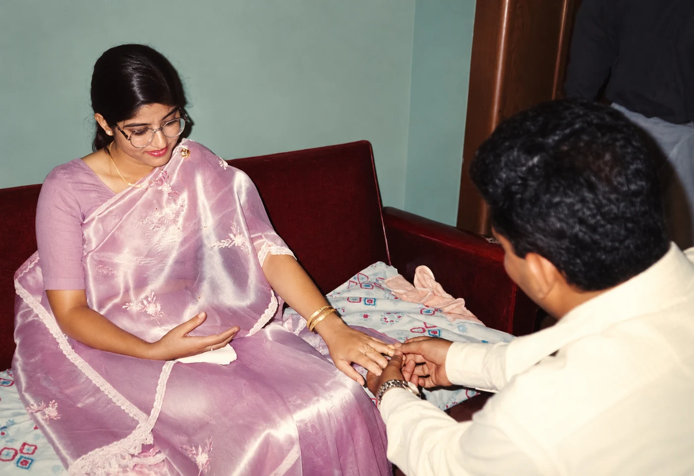 An early memory of the couple exchanging a ring
